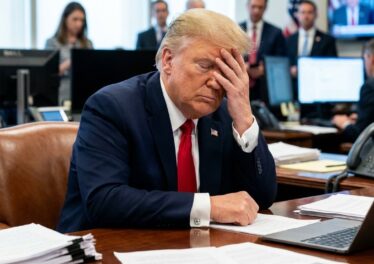 Trump facepalming himself with high stress